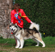 Karen and Charger pose with his Reserve to Best Dog Award at the Crufts Dog Show in England, 2009